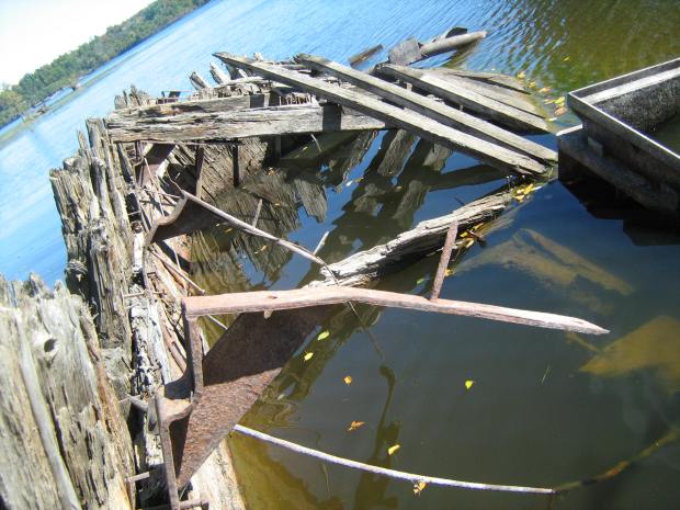 Interior of the shipwreck showing ribs, deck planks.
