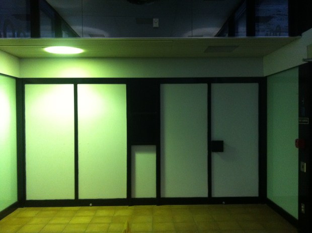 The original main entrance to the Place De Ville theatre. Now boarded up, these doors lead to the main lobby area and escalators to the second level cinema.