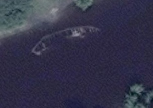 Satellite image showing what appears to be the submerged hull of a ship.