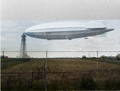 Long since destroyed, a composite image showing the R100 and the mooring tower ghosted over the same view today.