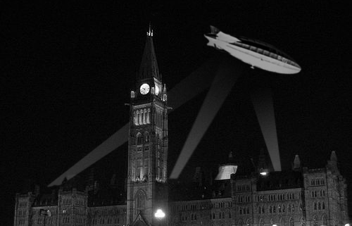 My artist's rendition of how the R100 may have looked hovering ob=ver the Parliament Buildings with searchlights on it as it passed over the city August 10 1930.