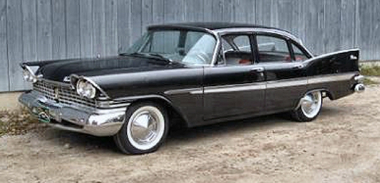 Bond rents a Plymouth 4 door sedan for his drive to Ottawa.