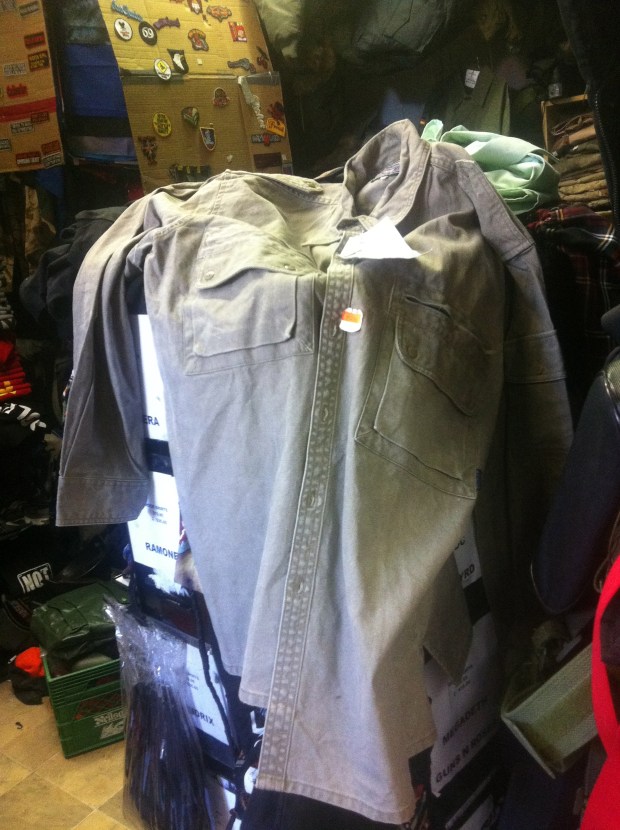 "...khaki shirt, dark brown jeans, good climbing boots or shoes. See they're comfortable."