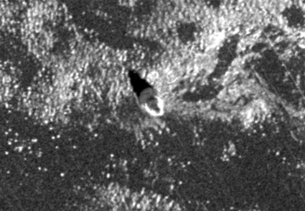 A 1965 aerial image shows that the beacon was still in place on its pedestal on the Ottawa River.