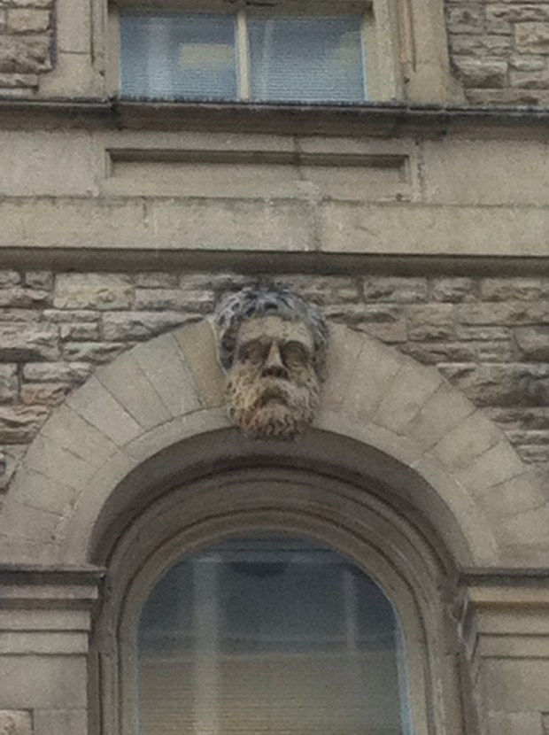 All ten of the eleven keystone heads are similar in appearance.